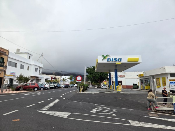 DISA fuel station on the main junction in Arico with service bays and pumps.