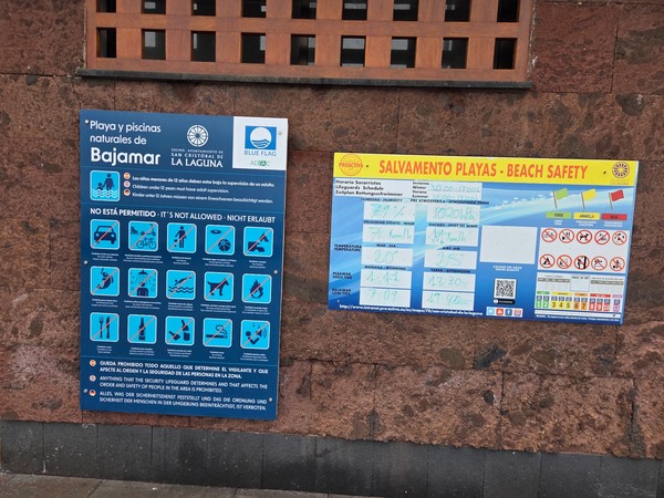 Information boards for Bajamar beach and natural pools including Blue Flag and safety details.
