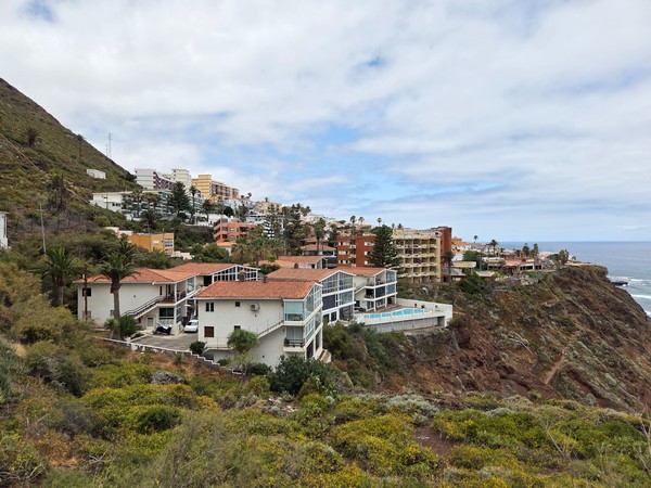 View of Bajamar’s coastal cliffs with holiday apartments and the Atlantic.