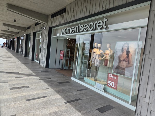 Women’secret storefront with mid-season sale signage.