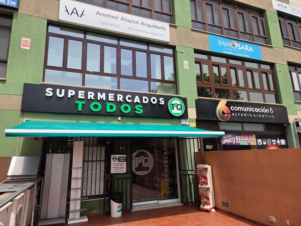 Supermercados TODOS storefront under office buildings in La Chafira.