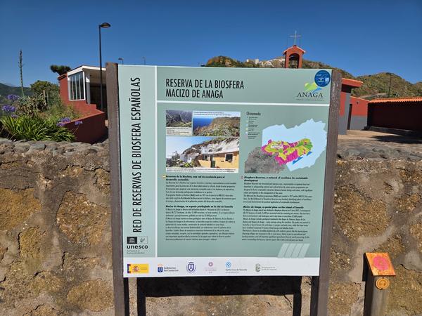 Sign detailing Chinamada as part of the Anaga Biosphere Reserve with a map of hiking trails and conservation areas.
