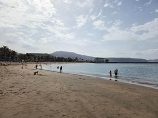 Golden sand and sunbeds at Playa El Camisón