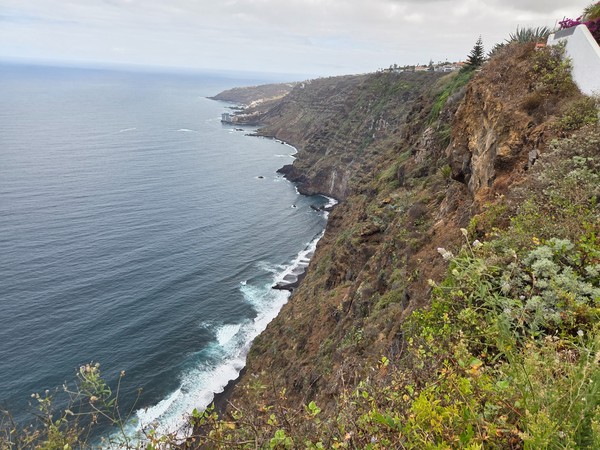 Panoramic view from El Sauzal’s cliffside mirador across the north coast of Tenerife and the Atlantic Ocean.