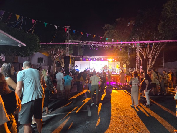 Live band performing on the main stage with dancers in front at the Fiestas de El Fraile 2025.