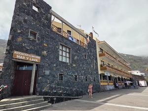 Street scene in Garachico with traditional Canarian architecture and cafes.