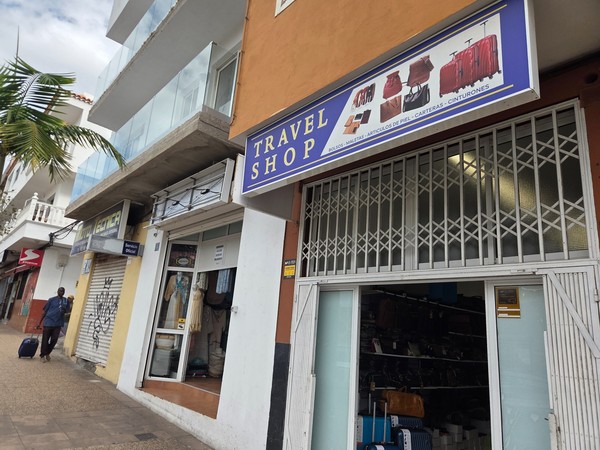 Travel Shop in Guaza Tenerife with suitcases and leather bags displayed inside the open entrance.