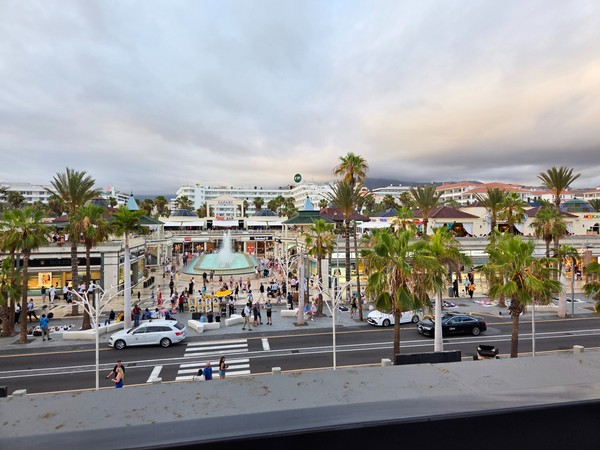 Panoramic view from the Hard Rock Cafe Tenerife rooftop across the Safari shopping center on the Golden Mile of Playa de las Américas.