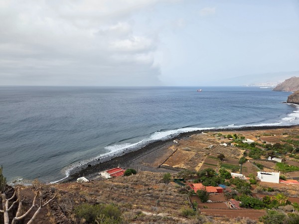 Small gardens and terraced plots near the coast of Igueste de San Andres beside the pebble beach.