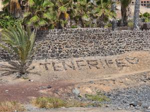 Tenerife sign made of stones near the beach