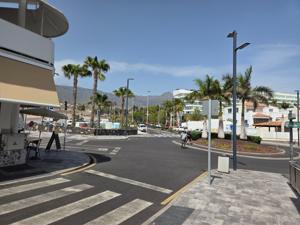 Street with palm trees in La Caleta