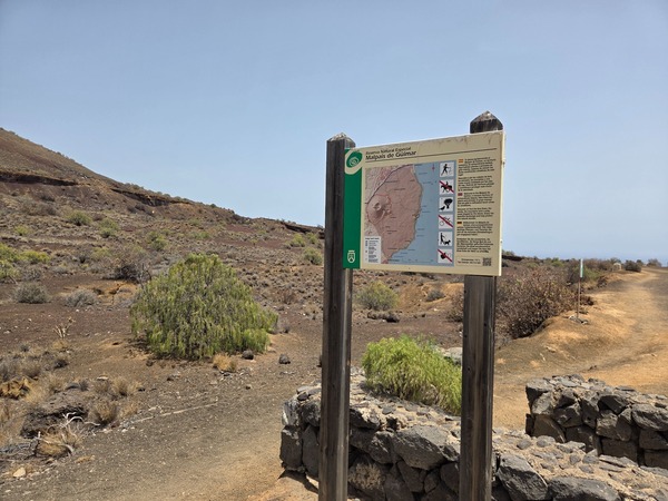 Entrance sign with map and rules of the Malpaís de Güímar Special Nature Reserve.