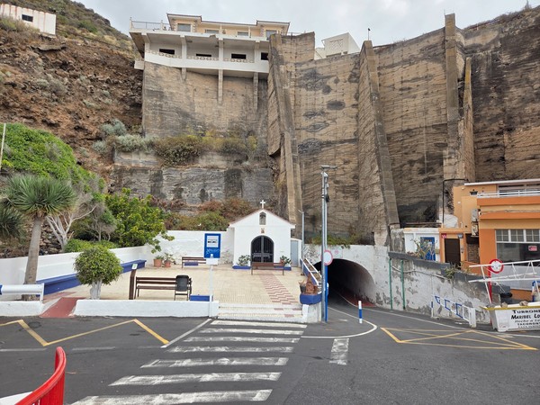 Small chapel and vehicle tunnel under the cliff at Mesa del Mar, Tenerife.