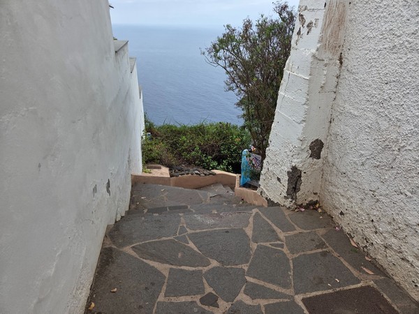 Stone steps between whitewashed walls descend toward the Atlantic at Mirador de los 500 Escalones Stone steps between whitewashed walls descend toward the Atlantic at Mirador de los 500 Escalones.