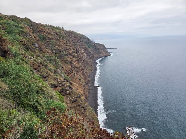 Wide view of the Costa de Acentejo cliffs and waves below, near La Garañona in Tenerife Wide view of the Costa de Acentejo cliffs and waves below, near La Garañona in Tenerife.