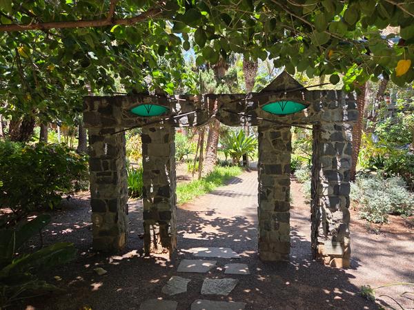 Decorative eye sculptures in stone archway