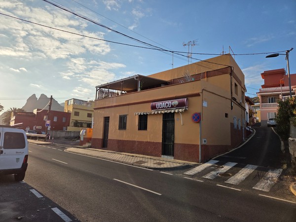 UDACO minimarket on a corner street in Punta del Hidalgo.