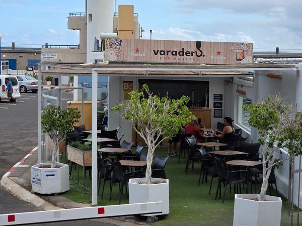 Outdoor seating at Varadero Bar near the marina entrance.