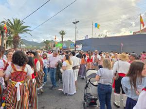 Crowds in traditional dress at Tejina festival