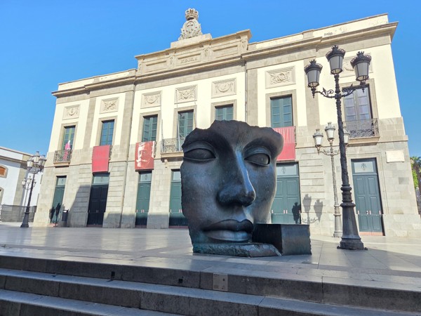 Large bronze face sculpture in front of Teatro Guimerá, Santa Cruz de Tenerife.